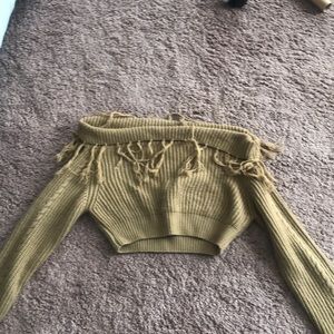 Tan off the shoulder sweater.